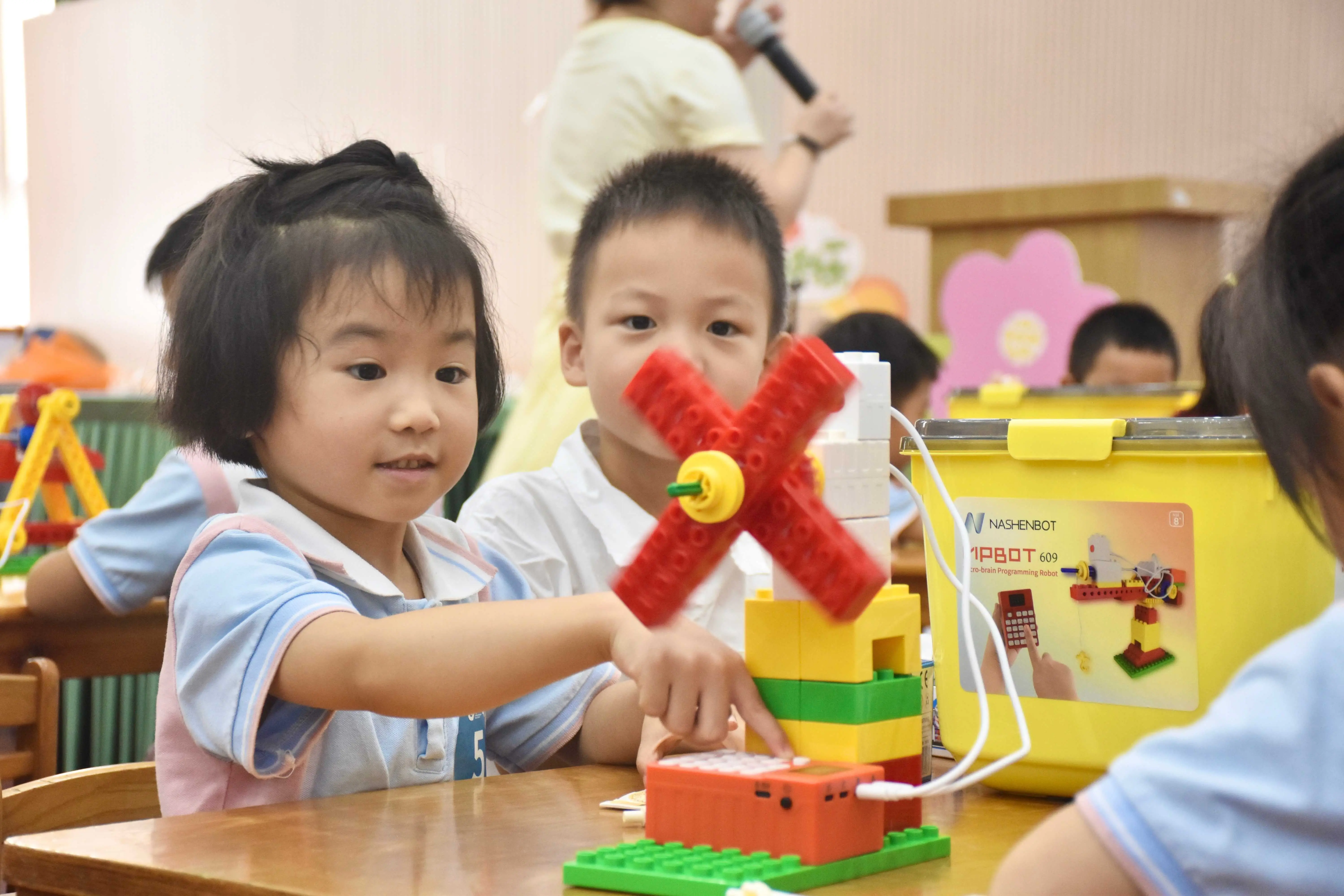 Children building by hand